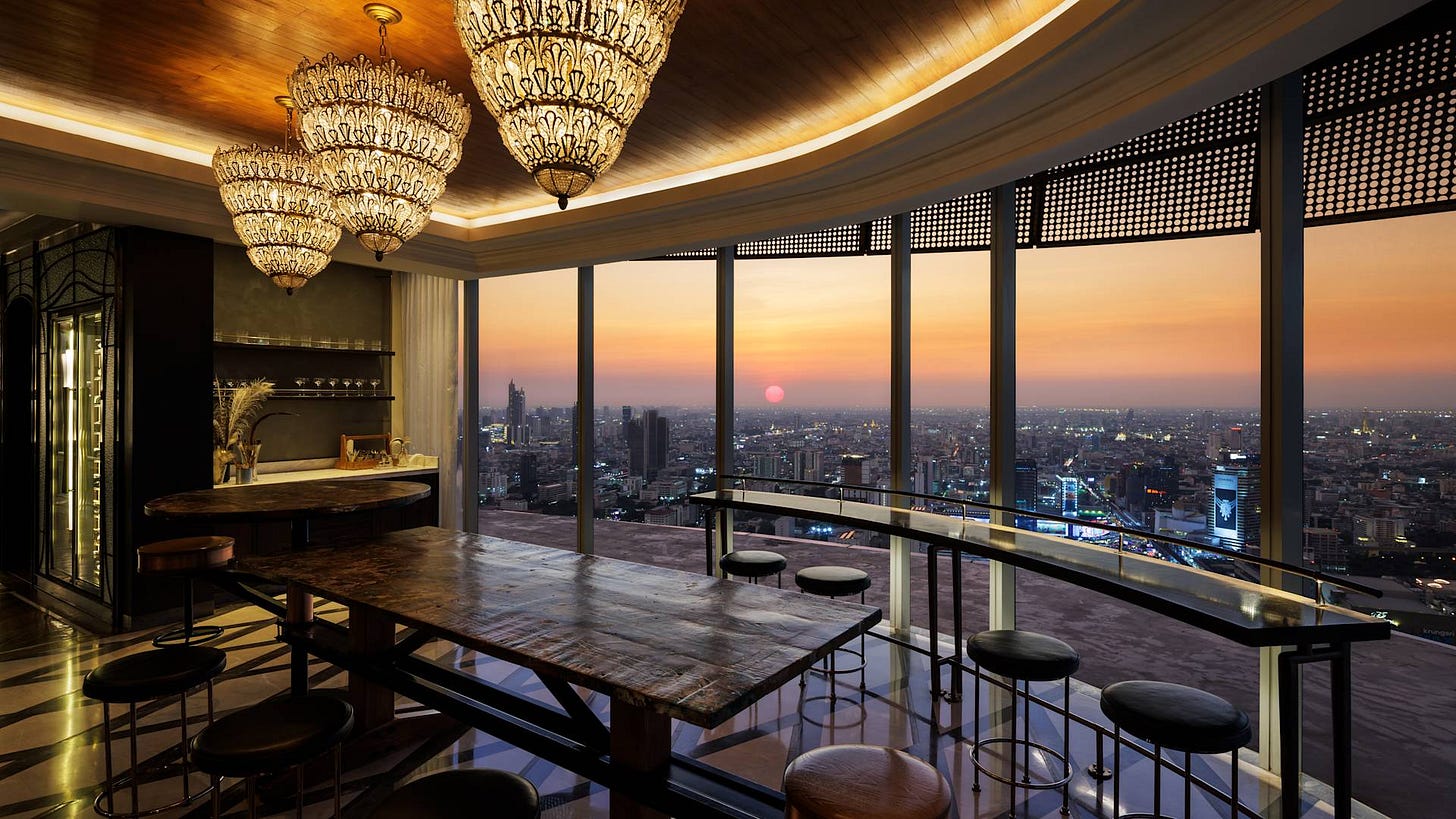 Large Table at The Loft Restaurant with Panoramic Views of the City at Sunset Large Table at The Loft Restaurant with Panoramic Views of the City at Sunset