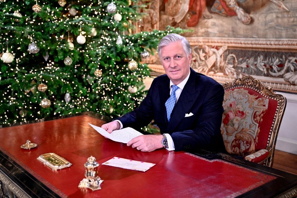 King Philippe of Belgium in front of a Christmas tree holding a speech