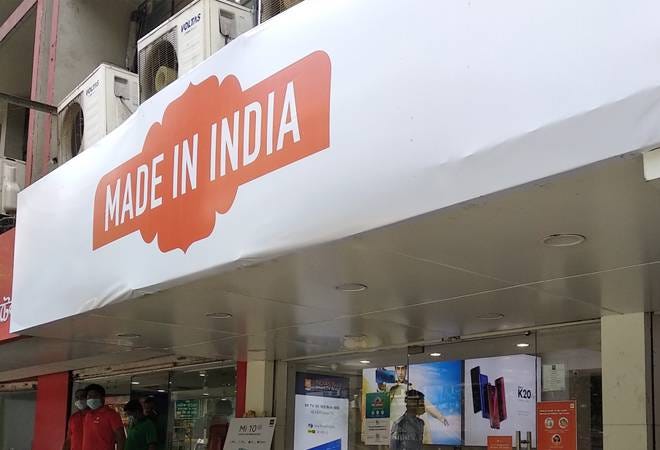 Xiaomi covers stores with 'Made In India' banners as calls for 'Boycott Chinese products' grow stronger Xiaomi covers stores with 'Made In India' banners as calls for 'Boycott Chinese products' grow stronger