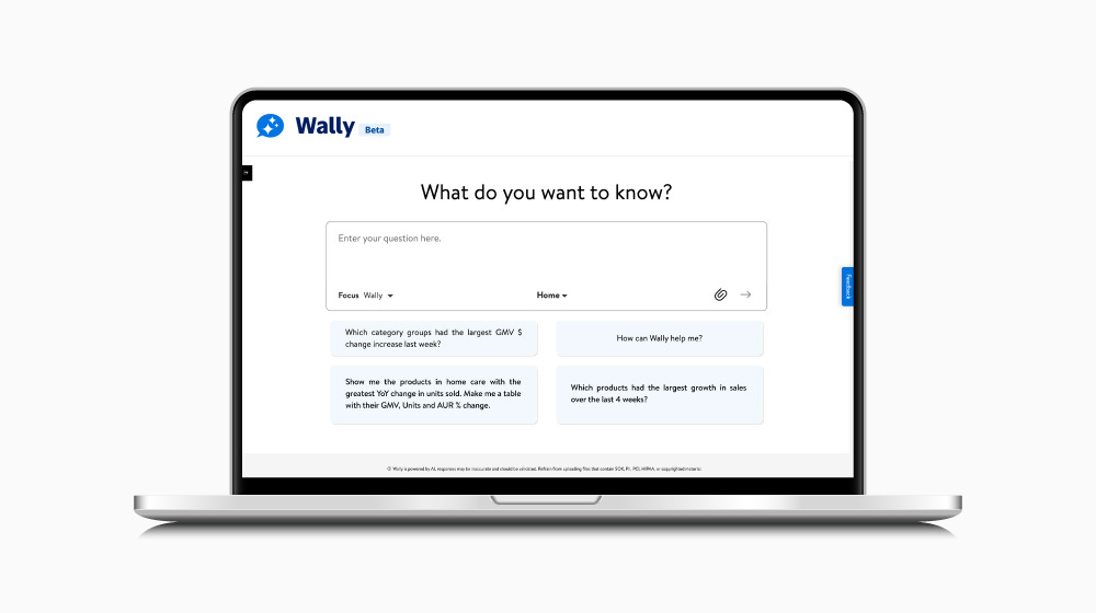 An example screen capture of Wally GenAI on a laptop screen. The Wally logo is visible in the top left of the screen with copy below reading, "What do you want to know?" A box for users to type copy is below, as well as suggested example prompts.