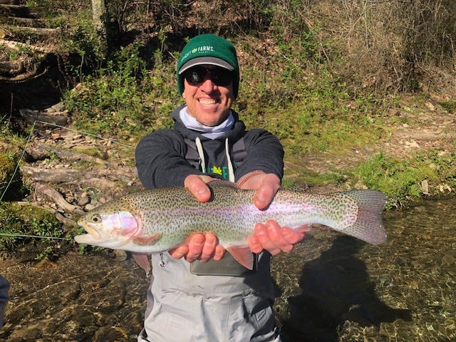 Me fishing/smiling around the corner from The Hub a few weeks ago.