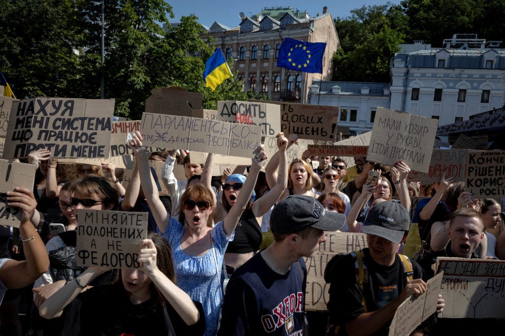 Ukrainians protest Zelenskyy's ouster of his popular defense minister | PBS  News