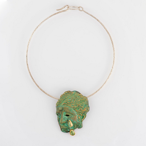 Hypatia ring; 22kt recycled gold, recycled platinum and natural diamonds; Hypatia Red brooch and pendant, 18kt recycled gold and garnets: Hypatia Green brooch and pendant, 22kt recycled gold, recycled silver, green garnets; all by Joy BC courtesy of Elisabetta Cipriani Gallery
