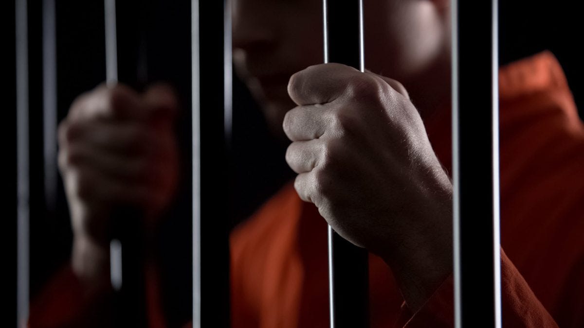 Atheists and Humanists are all-but-absent in federal prisons, according to new data | A person in a prison cell
