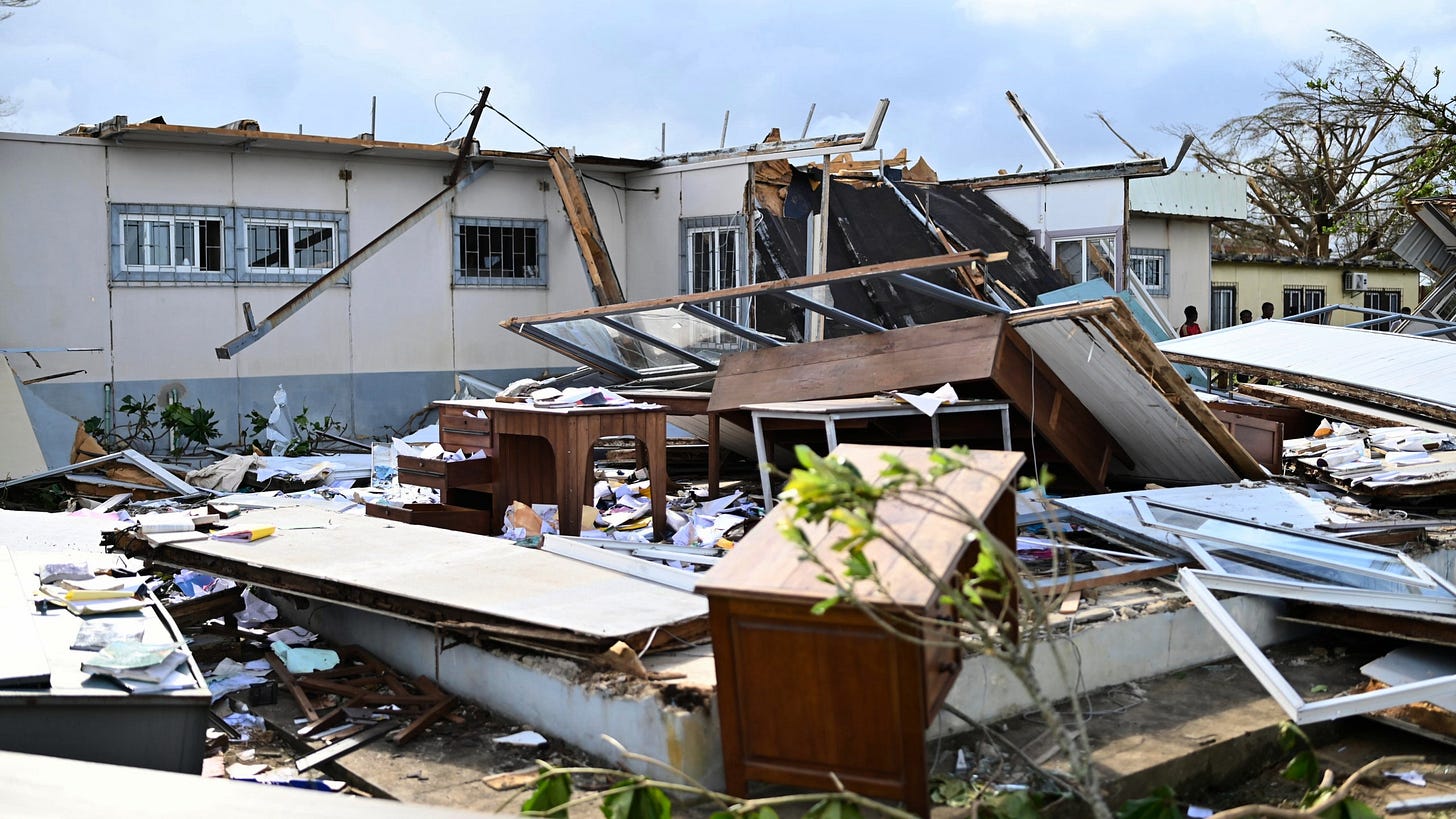 People survey the damage done by cyclone Gezani in Toamasina, Madagascar, Wednesday, Feb. 11, 2026. (AP Photo/Hery Nirina Rabary) People survey the damage done by cyclone Gezani in Toamasina, Madagascar, Wednesday, Feb. 11, 2026. (AP Photo/Hery Nirina Rabary)