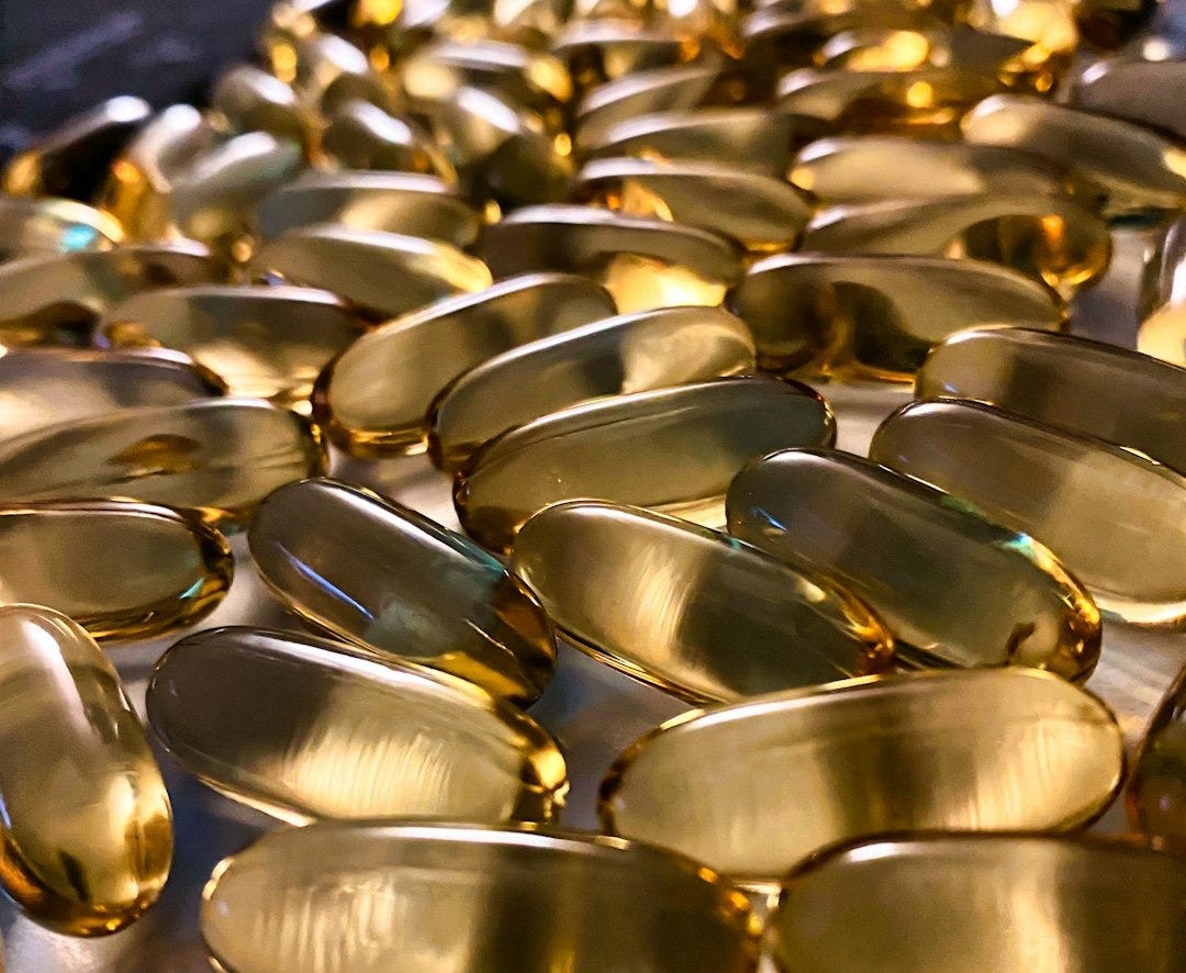 gold round coins on blue textile gold round coins on blue textile