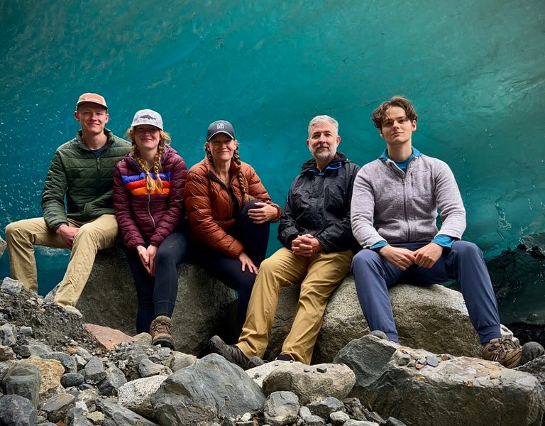 Larry and family in front of a glacier in Alaska