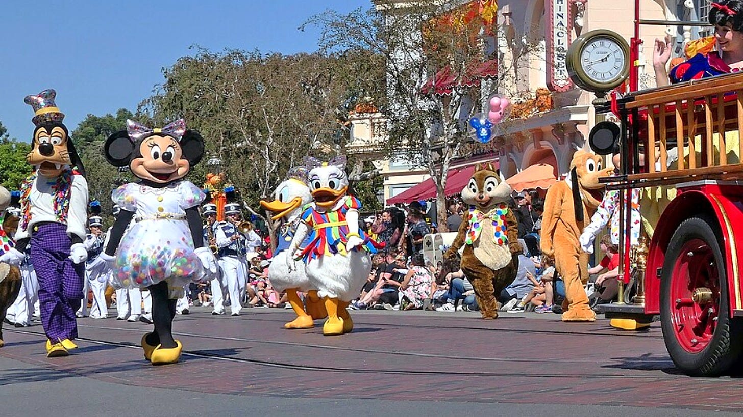 Goofy, Minnie Mouse and friends in a Disney parks parade. Image: Bernard Spragg via Wikimedia Commons