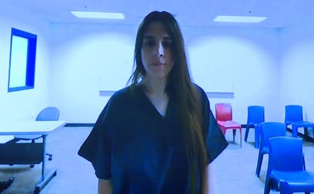 Allison Howlett in a jail uniform during a court appearance. Allison Howlett in a jail uniform during a court appearance.