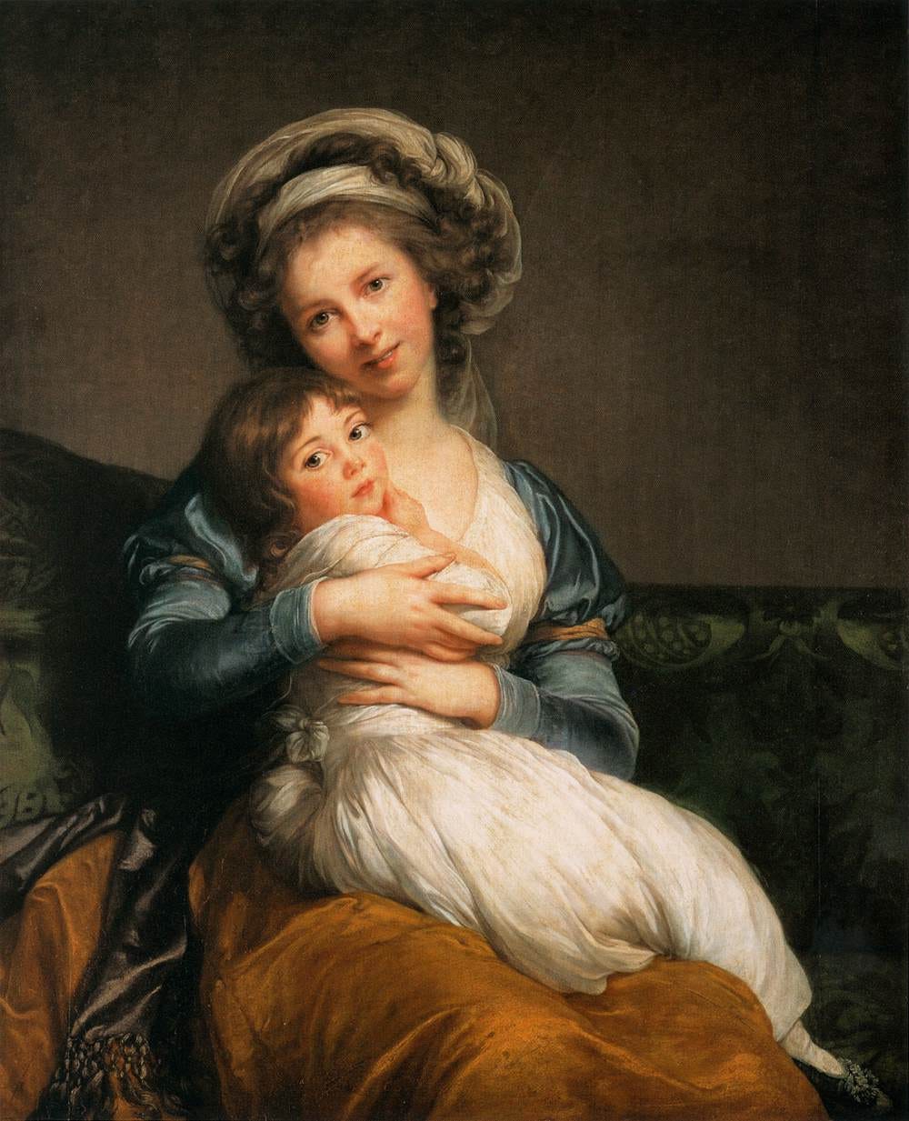 Smiling painter hugging daughter