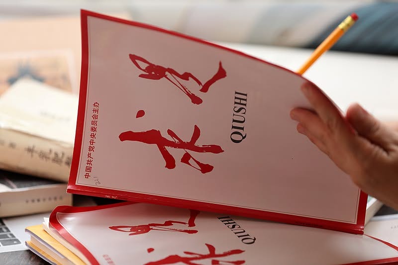 May be an image of studying and text