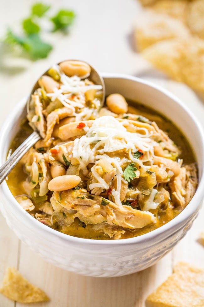 Easy 30-Minute Homemade White Chicken Chili in a bowl with a spoon on top. Easy 30-Minute Homemade White Chicken Chili in a bowl with a spoon on top.