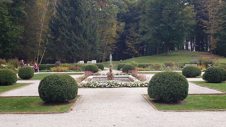 Edith Wharton's home The Mount. View from the window to the gardens and Laurel Lake, the French flower garden, Lime Walk, and sunken Italian garden.