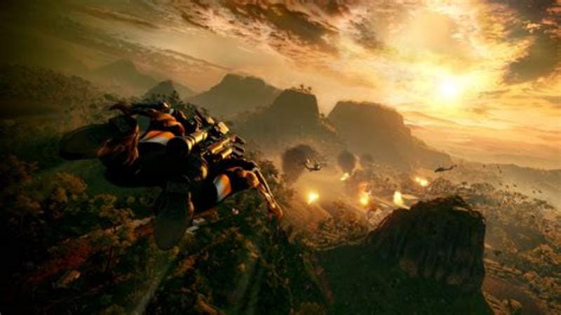 A man shoots forward in freefall towards an orange sunset.