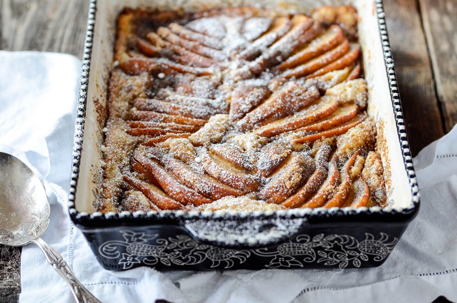 A photo of a baking dish with Pear and Cardamom Cobbler from The Oregon Farm Table Cookbook