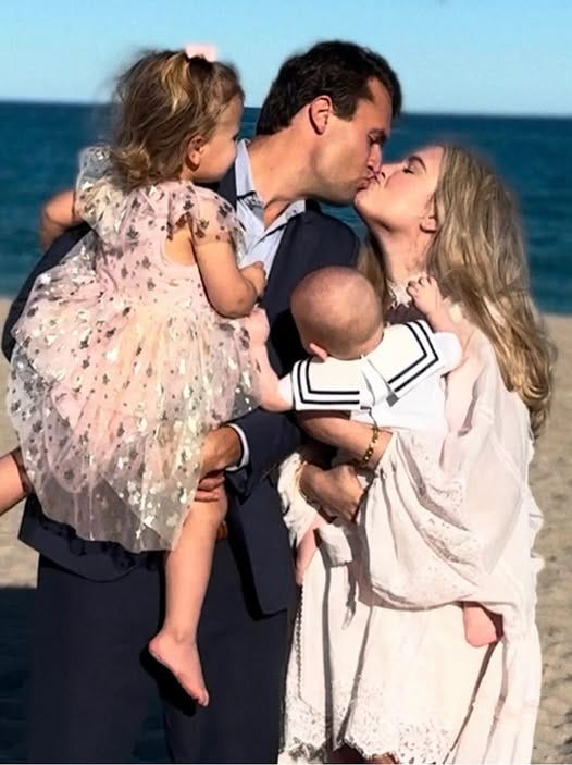 May be an image of 2 people and baby