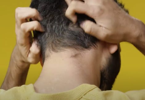 A person with his hands on his head

AI-generated content may be incorrect.