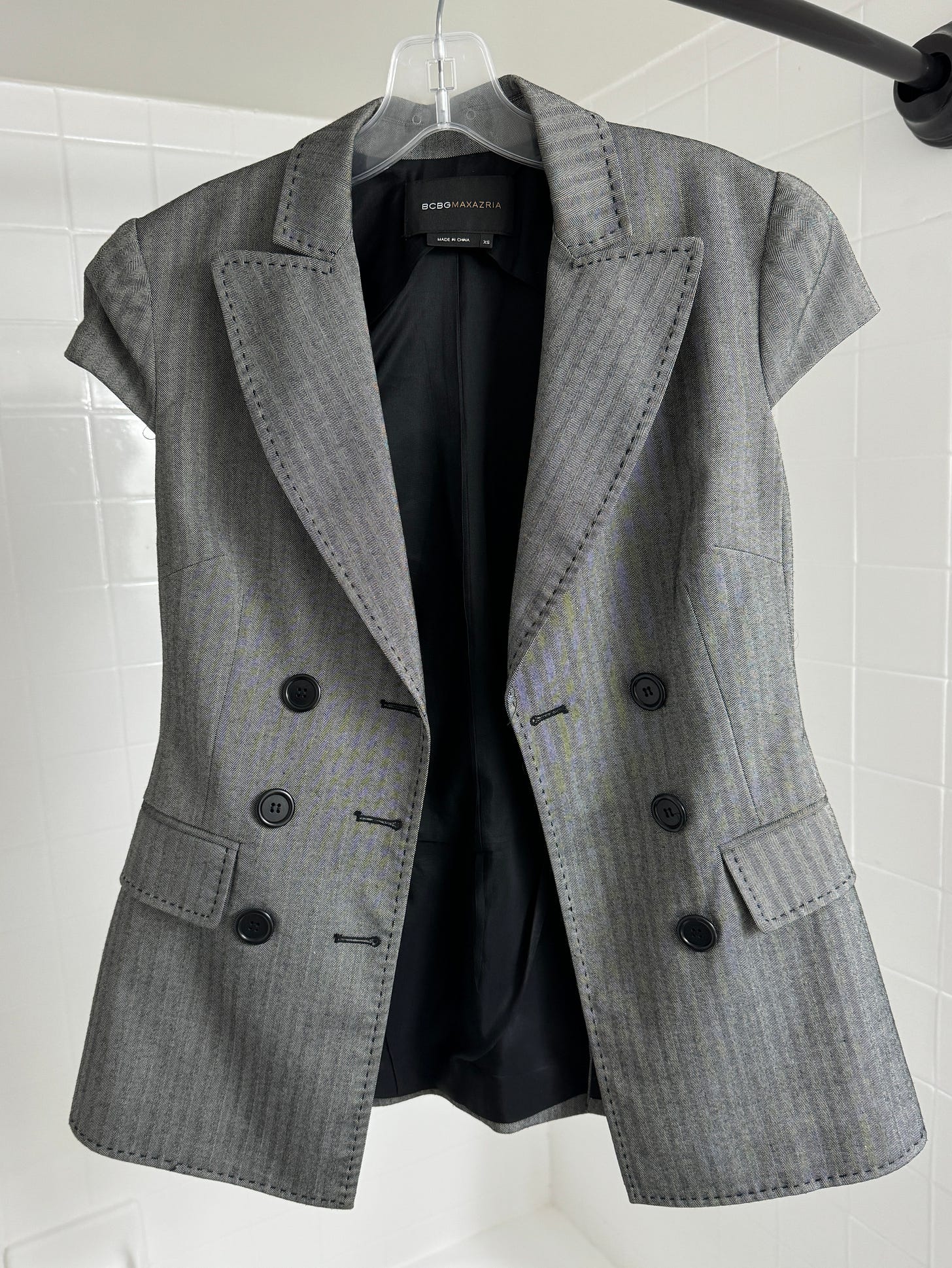 A grey, cap-sleeved vest