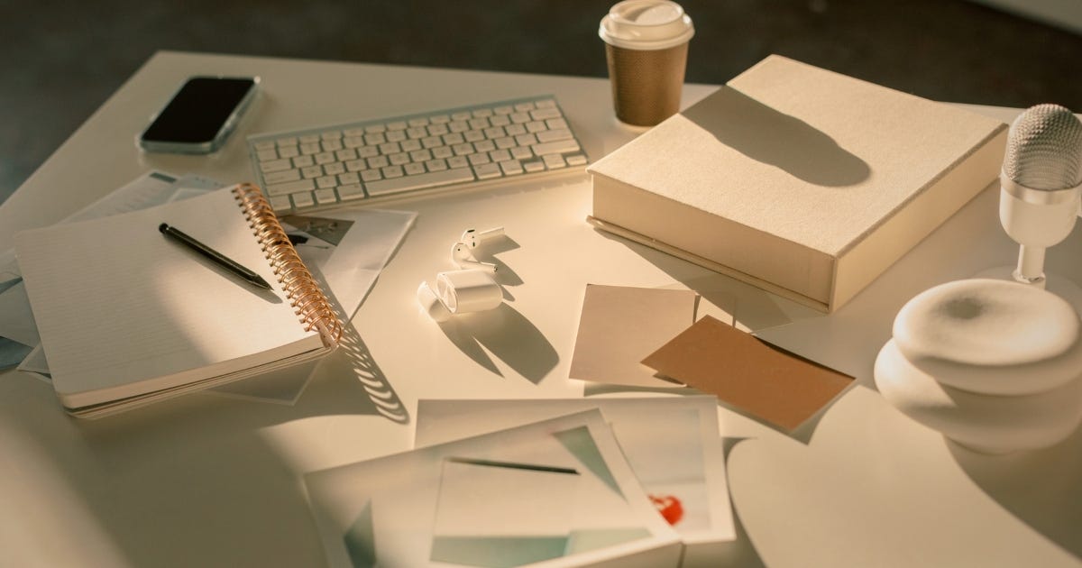 18:34Claude responded: A consultant's desk scattered with notebooks, loose papers, a keyboard and a takeaway coffee, reflecting the quiet chaos of content that isn't reaching the rig…A consultant's desk scattered with notebooks, loose papers, a keyboard and a takeaway coffee, reflecting the quiet chaos of content that isn't reaching the right reader at the right moment.