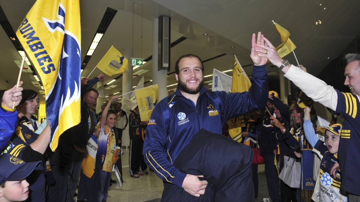 Ben Alexander celebrates with fans at Canberra Airport before the 2013 Super Rugby final. The year was one of the best, but also the toughest, of his life. Picture by Melissa Adams Ben Alexander celebrates with fans at Canberra Airport before the 2013 Super Rugby final. The year was one of the best, but also the toughest, of his life. Picture by Melissa Adams