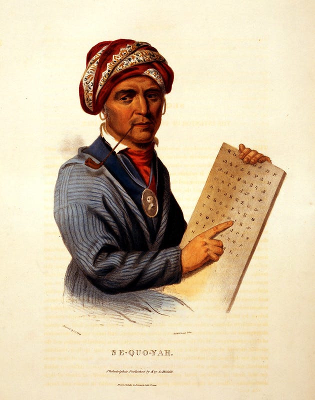 Sequoyah depicted holding a tablet with his syllabary and pointing at it. Sequoyah depicted holding a tablet with his syllabary and pointing at it.