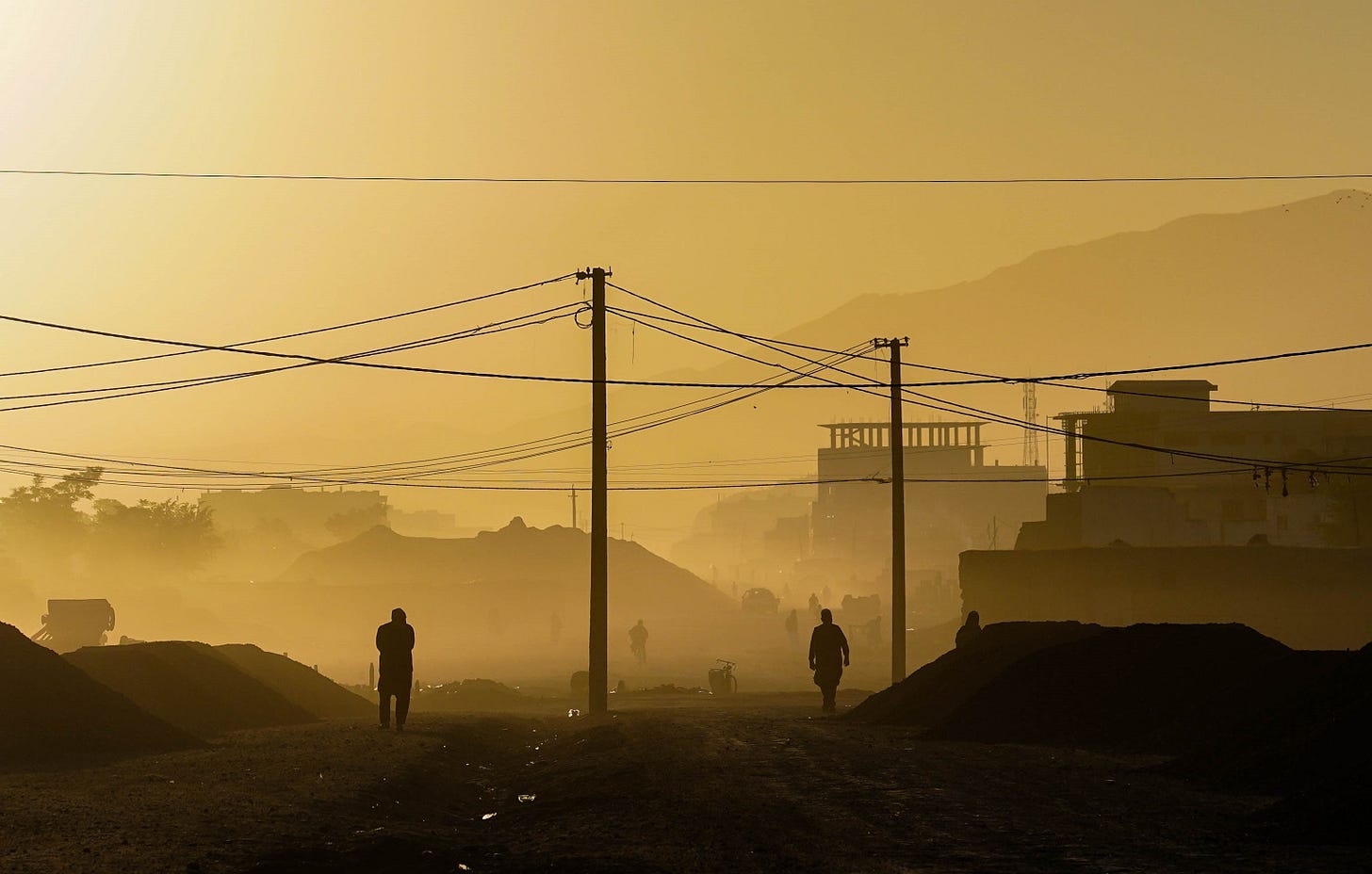 A hazy morning in Kabul looking over buildings and people. A hazy morning in Kabul looking over buildings and people.