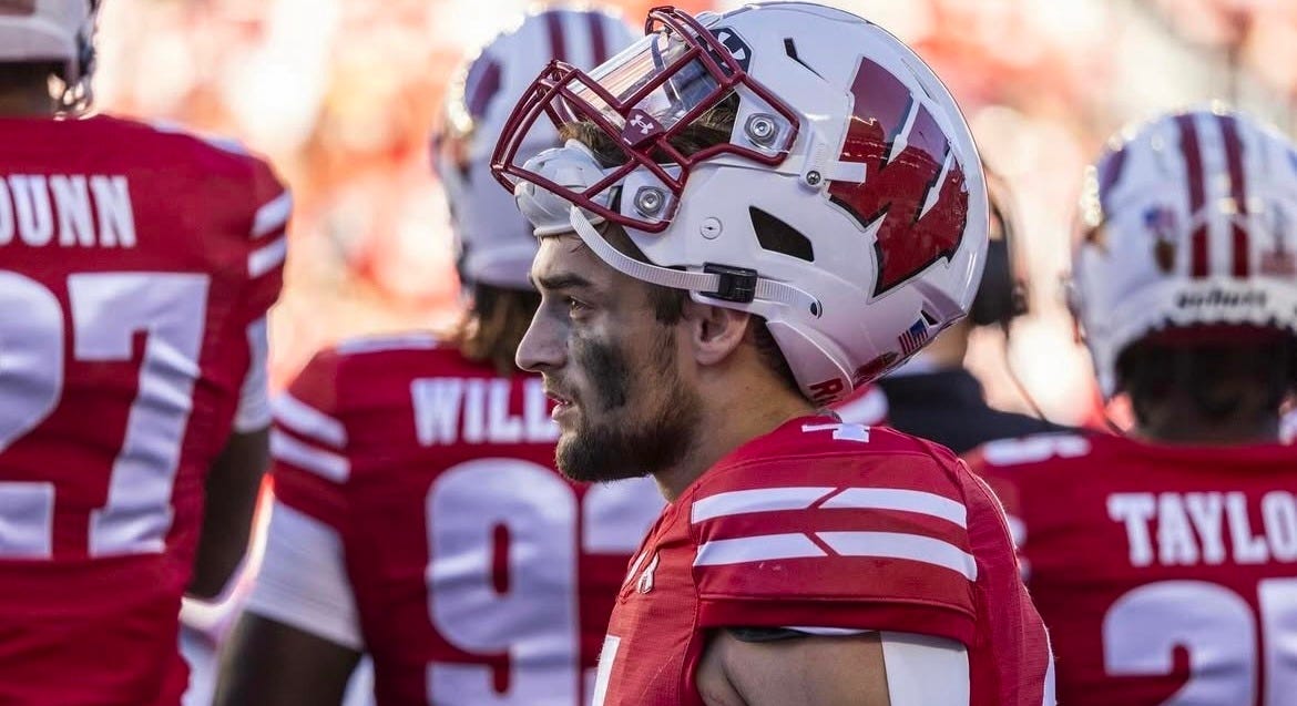 Wisconsin Badgers linebacker Tackett Curtis stands on the sideline