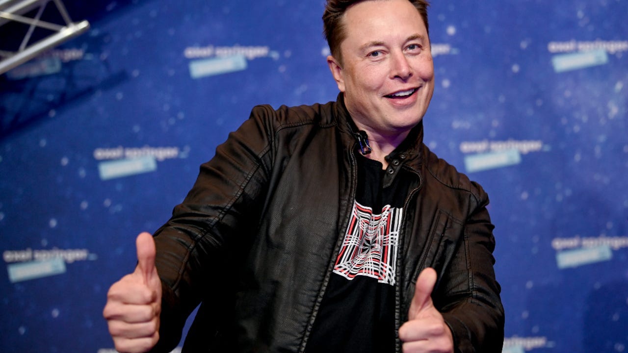 Elon doing thumbs up