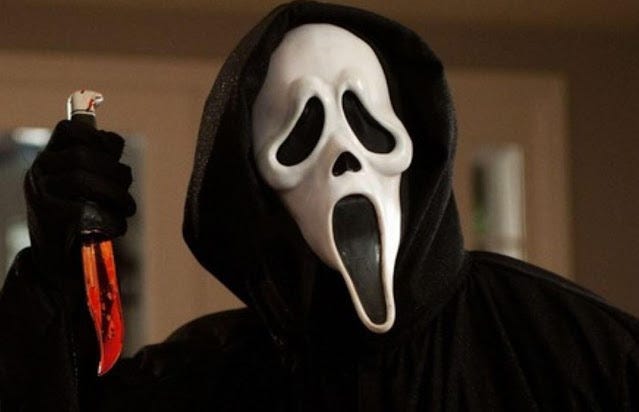 A person wearing a mask

Description automatically generated