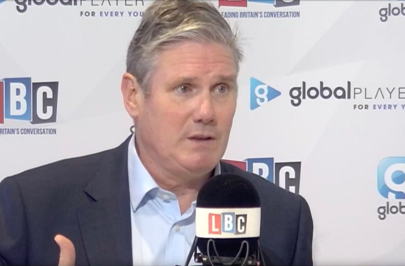 A mean speaking into a microphone A mean speaking into a microphone