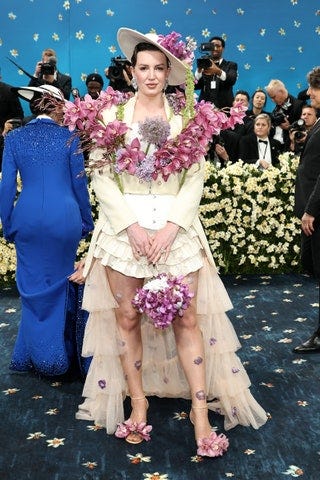 Image may contain Kelly Scott Yang Jun Person Photography Flower Flower Arrangement Flower Bouquet Plant and Face