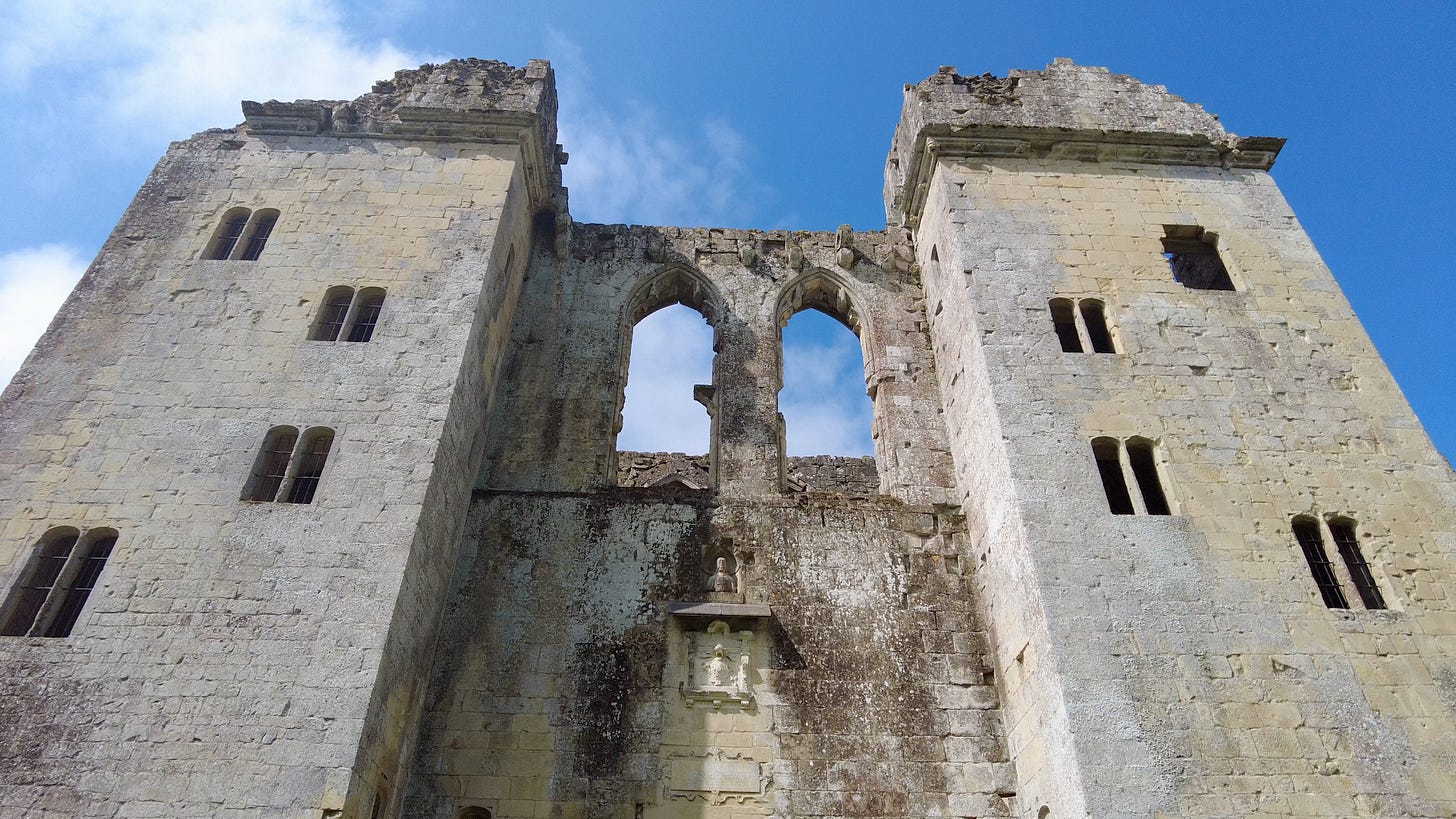 The front of the castle. Beneath the two central arched windows is the bust of Jesus, and below that, the family coat of arms. Image: Roland’s Travels The front of the castle. Beneath the two central arched windows is the bust of Jesus, and below that, the family coat of arms. Image: Roland’s Travels