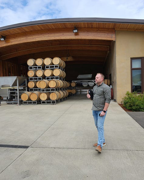 Luxury winery tour, beautiful cellar, vineyard soil, and Oregon wine country hospitality