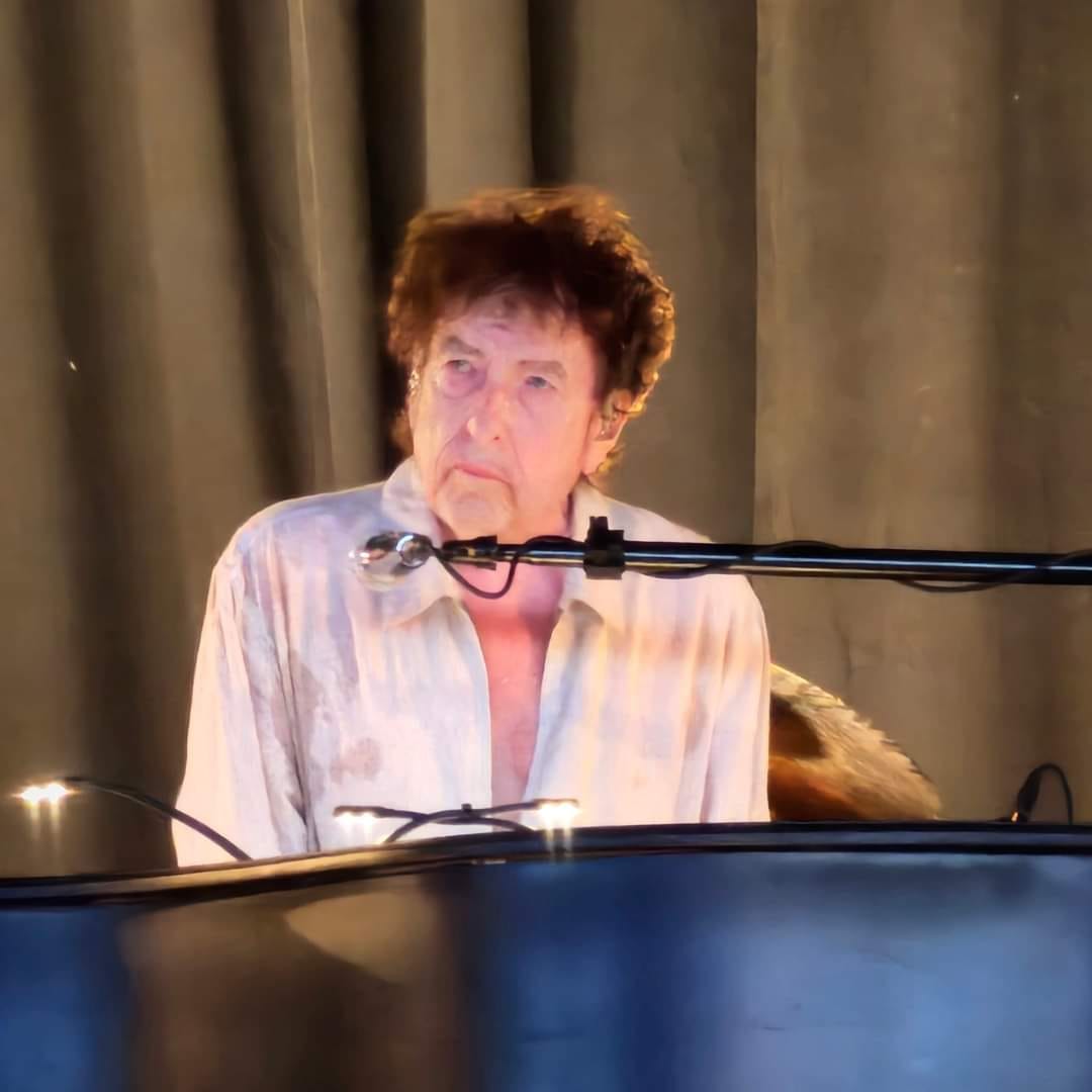 May be an image of 1 person and piano