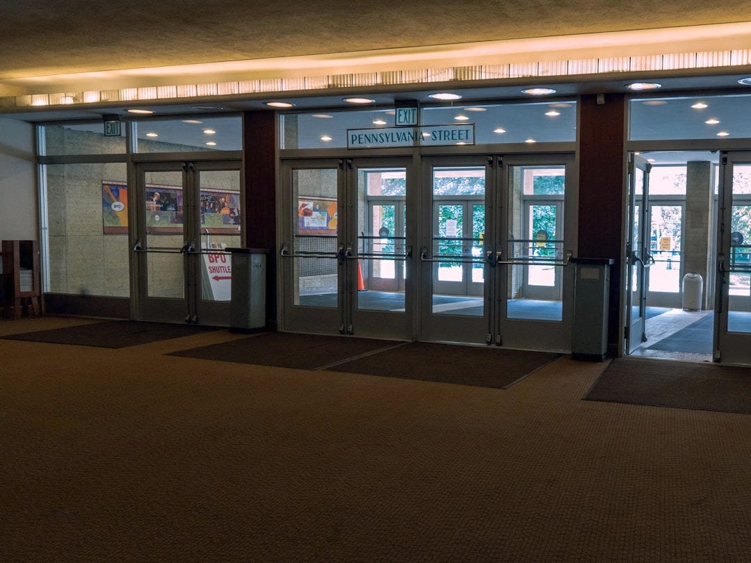 a large room with a lot of glass doors