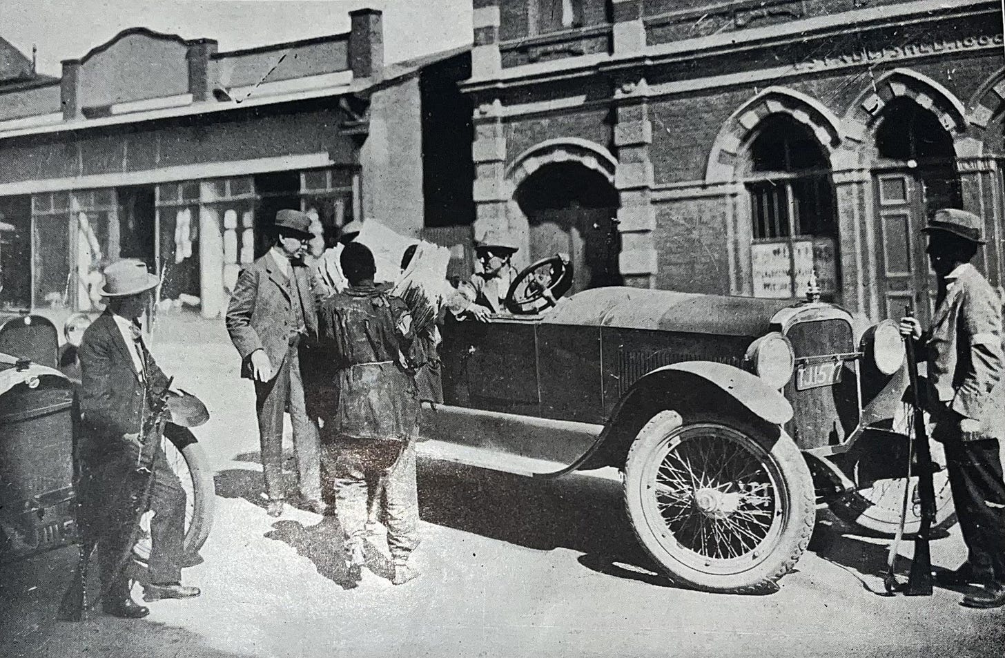 Armed members of 'The Star' News escort newspapers into Witwatersrand, defying embargoes and threats during the Rand Revolt. (March 1922).