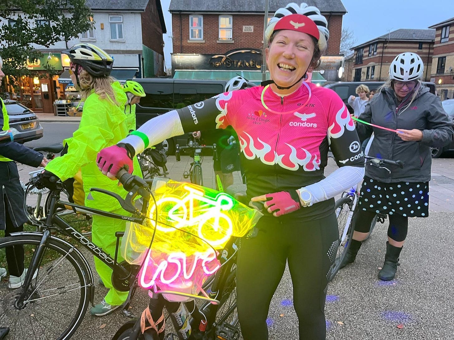 Cathryn Setz, Women’s Officer for the Cowley Road Condors standing with a cycle adorned with LEDs saying ‘Cycle Love’ Cathryn Setz, Women’s Officer for the Cowley Road Condors standing with a cycle adorned with LEDs saying ‘Cycle Love’