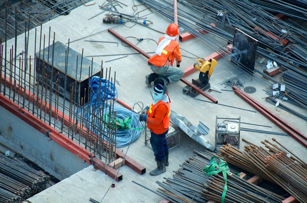 foreign workers are building the highest skyscrapers of the world in southeast asia. often under precarious working conditions. foreign workers are building the highest skyscrapers of the world in southeast asia. often under precarious working conditions.