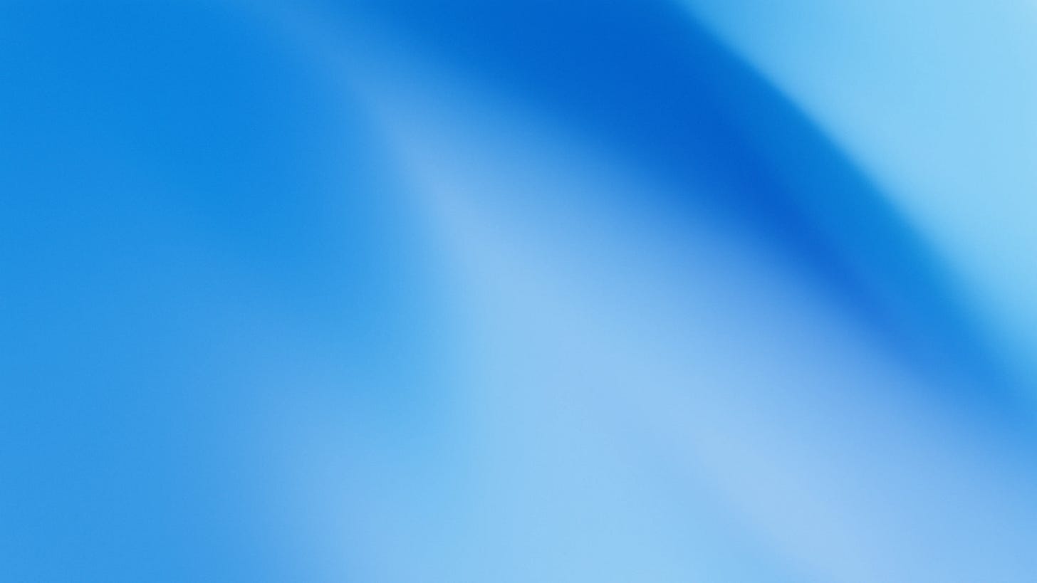Abstract image with rich blue gradients. Soft curves and light refraction suggest motion and depth, evoking precision, scalability, and technical confidence.