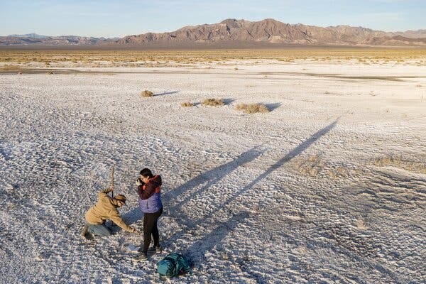 Patrick Donnelly and Naomi Fraga in a desert landscape.