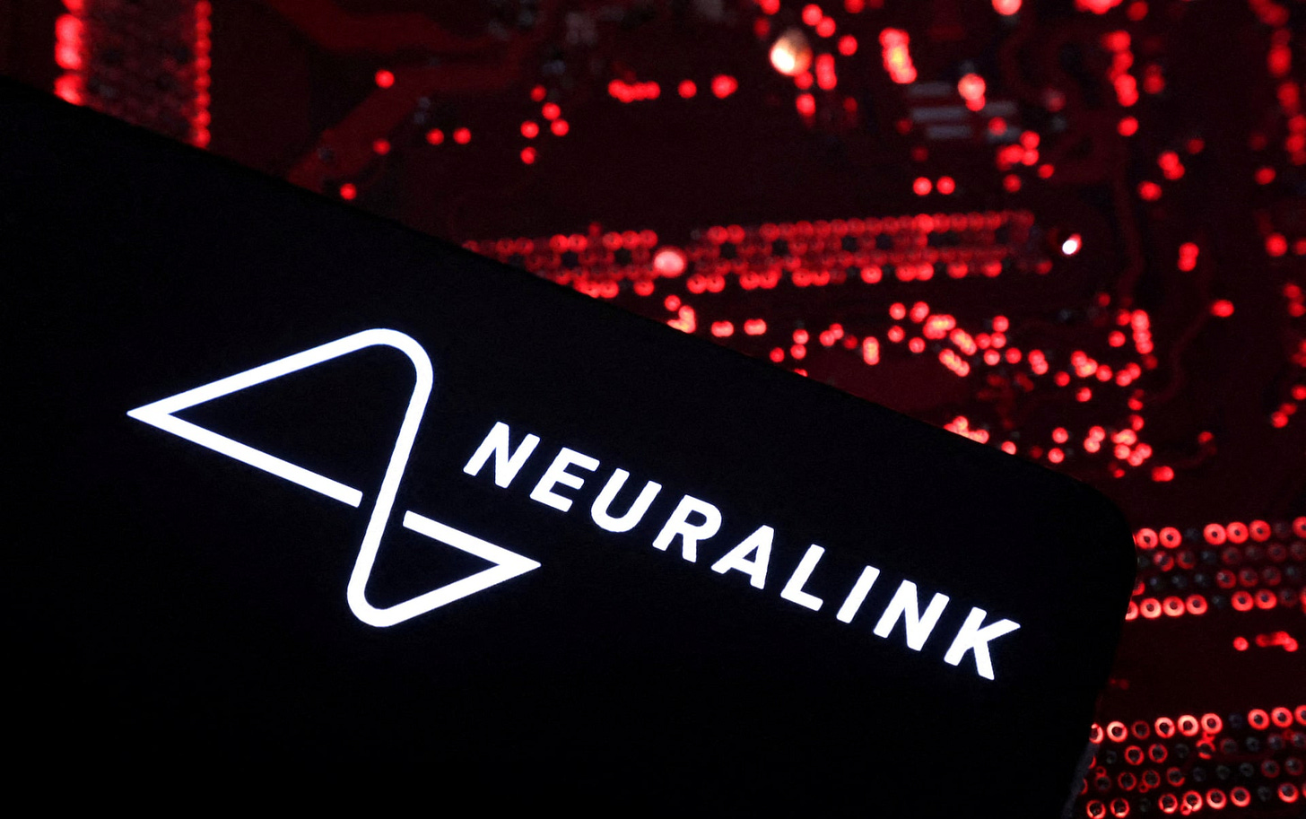 Neuralink plans 'high-volume' brain implant production by 2026, Musk says |  Reuters