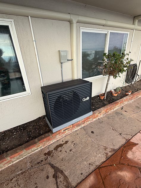 The images are of the back of a house with two fairly prominent black heat pumps, and electrical conduits sneaking across all of the walls.