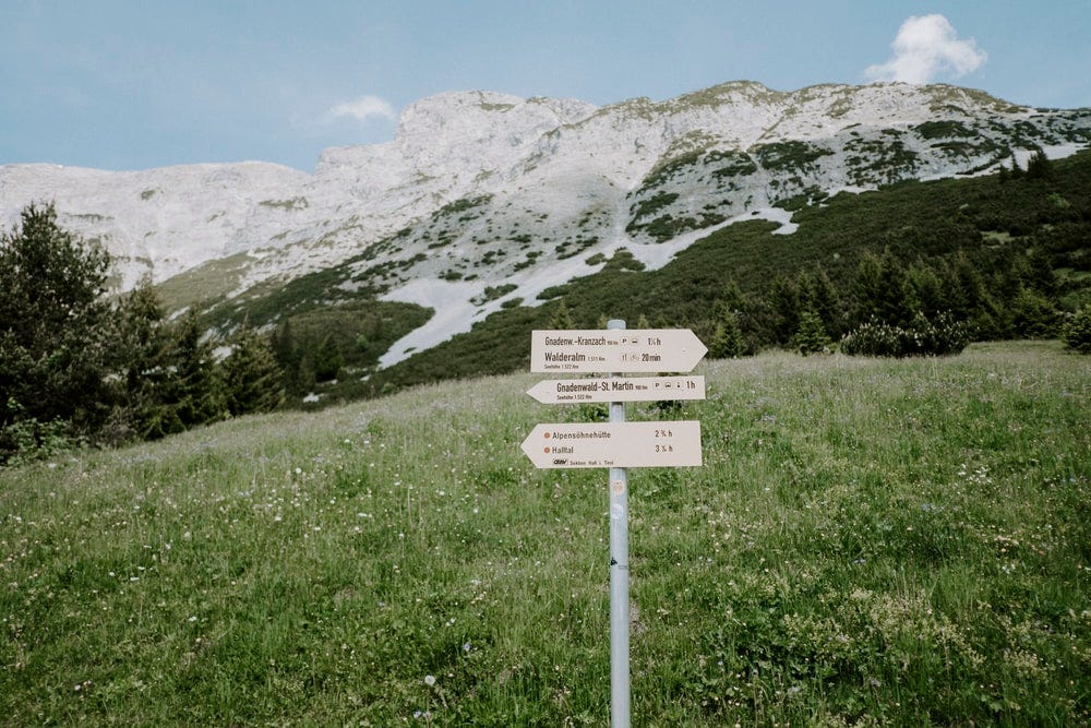 white signage near green grass field