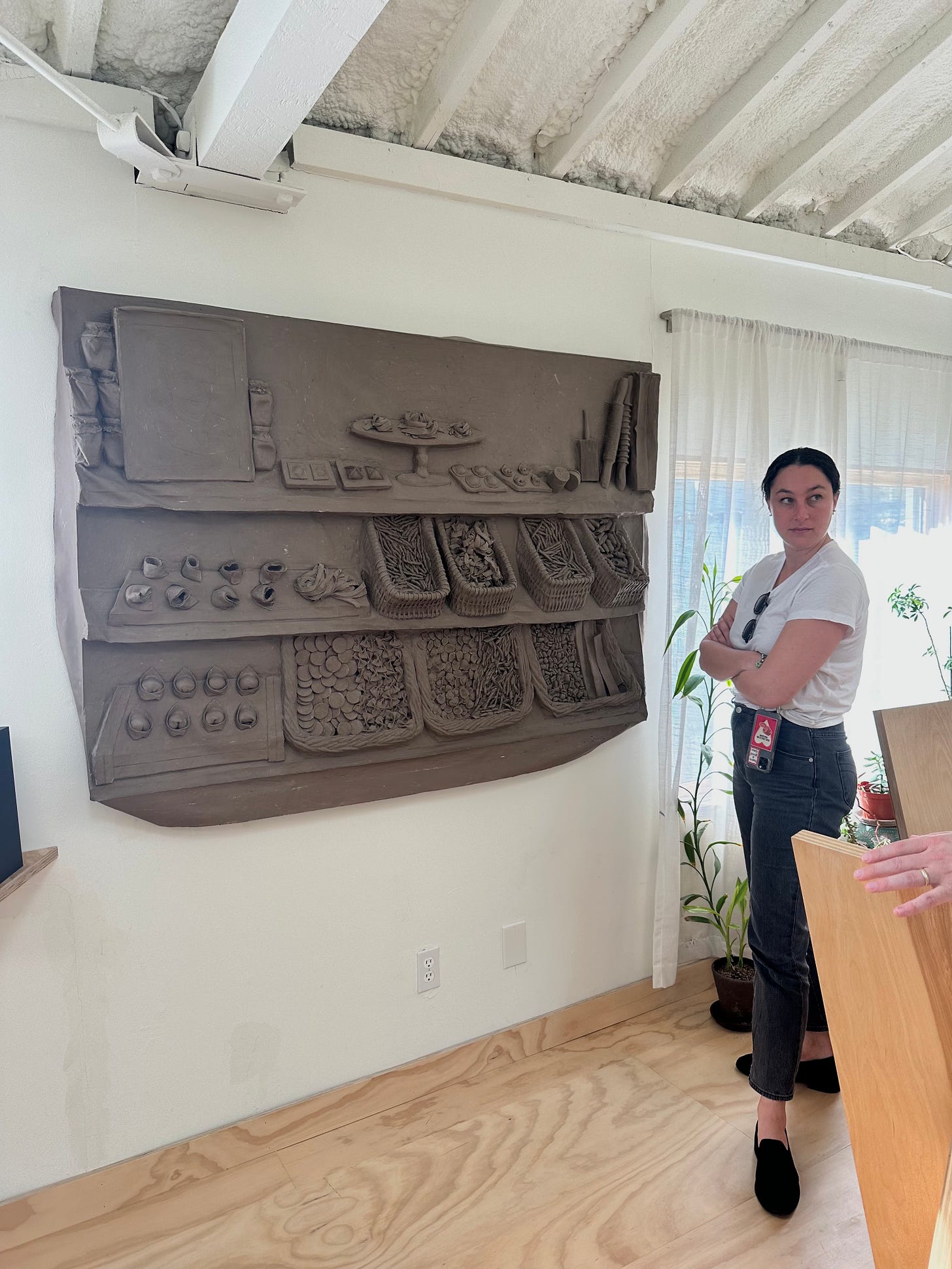 Hannah with an Anthony Miserendino in Moskoqitz Bayse's back room