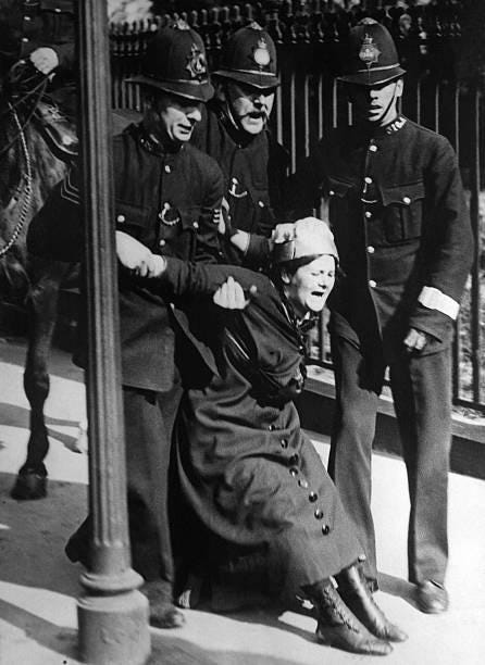 A defiant moment: a woman is arrested in 1914 for demanding the right to vote, a powerful image of the suffragette movement.