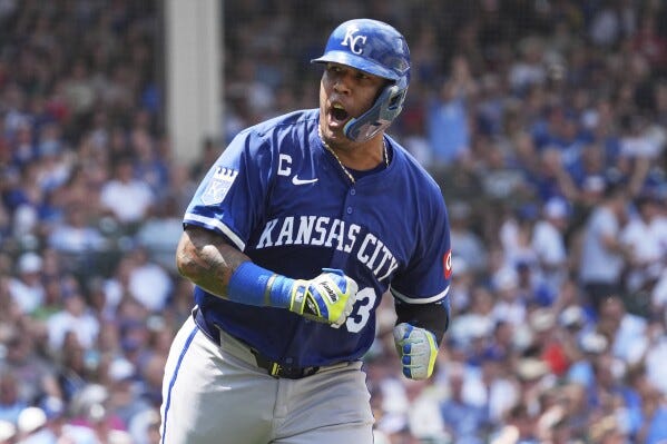Kansas City Royals' Salvador Perez reacts as he rounds the bases after hitting a two-run home run during the third inning of a baseball game against the Chicago Cubs in Chicago, Wednesday, July 23, 2025. (AP Photo/Nam Y. Huh)