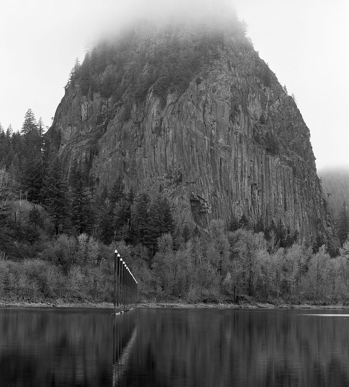 4x5 Camera set up aimed at a large rock formation, then the image it created