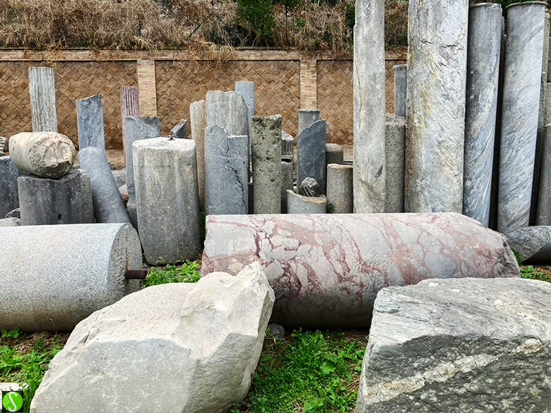 pile of roman columns in Rome. Photo by Steve Butcher