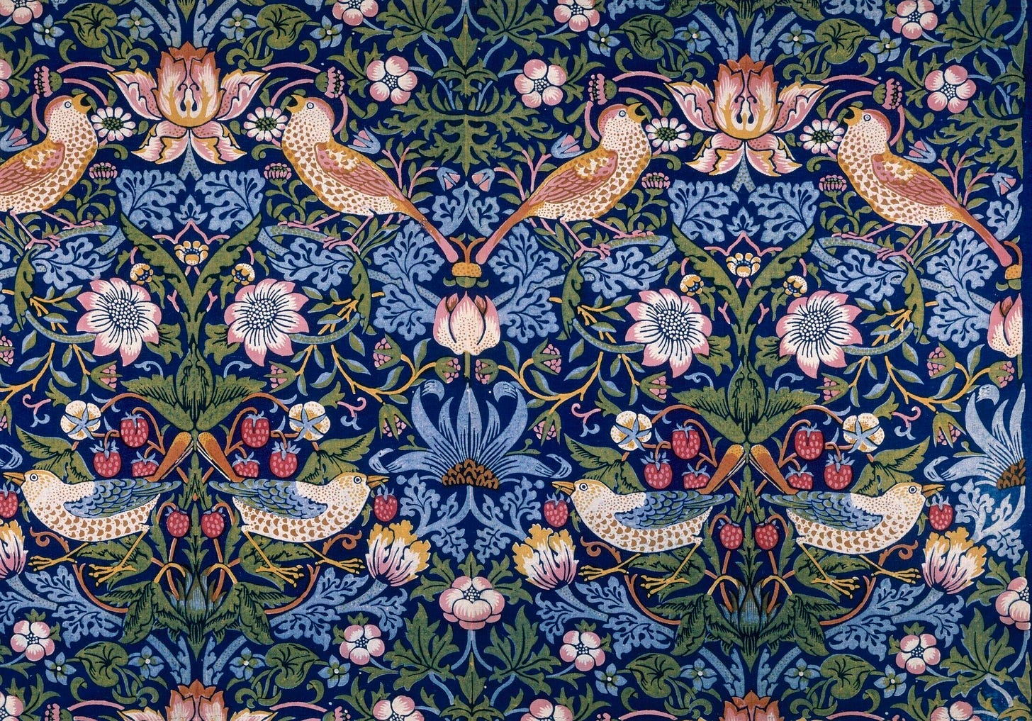 Detail of Strawberry Thief by William Morris: pairs of thrushes among strawberries and flowers on an indigo ground Detail of Strawberry Thief by William Morris: pairs of thrushes among strawberries and flowers on an indigo ground