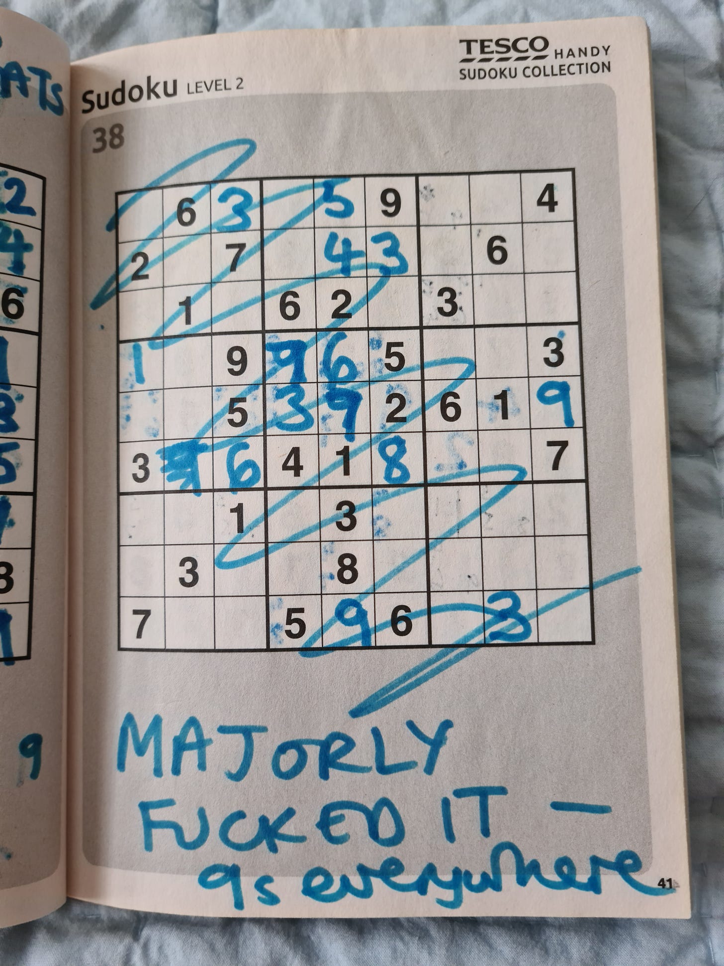A Tesco SUDOKU puzzle book variously completed by our dad and then KV after his death.